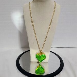 DISNEY 2015 GREEN EMBOSSED HEART MARKED ON BACK DISNEY 2015 & DISNEY DISGUISE